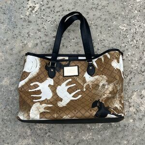 L.A.M.B. purse Gwen Stefani